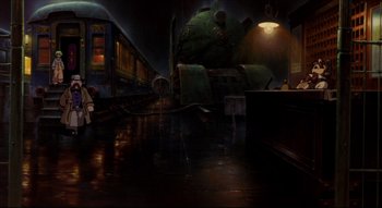 Movie still from “Metropolis” (2001), directed by Rintarô – A train is on the train tracks in a train station at night; Wide shot, High angle