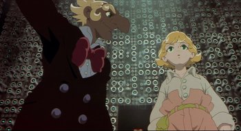 Movie still from “Metropolis” (2001), directed by Rintarô – A woman standing next to a man in front of a mirror; Medium shot, Low angle