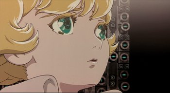 Movie still from “Metropolis” (2001), directed by Rintarô – A girl's face with green eyes; Close Up shot, Low angle