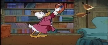Movie still from “Mickey and the Beanstalk” (1947), directed by Hamilton Luske – A cartoon of scrooge mcduck holding a book; Medium shot, Low angle
