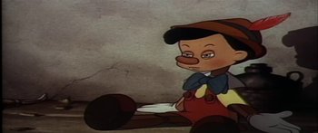 Movie still from “Mickey and the Beanstalk” (1947), directed by Hamilton Luske – A picture of a cartoon character with a sad face; Close Up shot, High angle