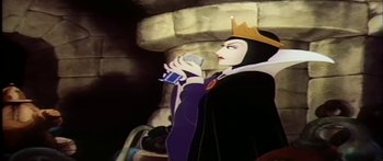 Movie still from “Mickey and the Beanstalk” (1947), directed by Hamilton Luske – A snow white character holding a drink; Medium shot, Low angle