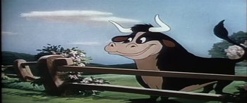 Movie still from “Mickey and the Beanstalk” (1947), directed by Hamilton Luske – A cartoon of a bull looking over a railing; Close Up shot, Low angle