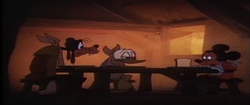Movie still from “Mickey and the Beanstalk” (1947), directed by Hamilton Luske – A goofy dog and a goofy dog standing next to each other in front of a table; Wide shot, High angle