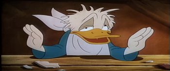 Movie still from “Mickey and the Beanstalk” (1947), directed by Hamilton Luske – The head of a cartoon duck; Close Up shot, High angle