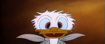 Movie still from “Mickey and the Beanstalk” (1947), directed by Hamilton Luske – The head of a cartoon duck; Extreme Close Up shot, Low angle
