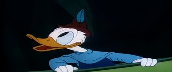 Movie still from “Mickey and the Beanstalk” (1947), directed by Hamilton Luske – A cartoon duck with a hat on; Close Up shot, Low angle
