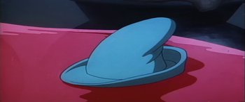 Movie still from “Mickey and the Beanstalk” (1947), directed by Hamilton Luske – A cartoon picture of a red car with a hat on it; Extreme Close Up shot, High angle