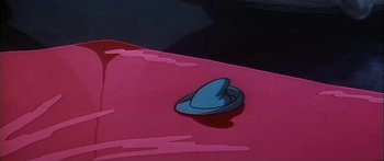 Movie still from “Mickey and the Beanstalk” (1947), directed by Hamilton Luske – View of a pink car's hood; Extreme Close Up shot, High angle