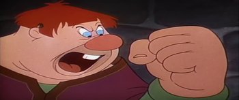 Movie still from “Mickey and the Beanstalk” (1947), directed by Hamilton Luske – An animated picture of a man with a goofy look on his face; Close Up shot, Low angle