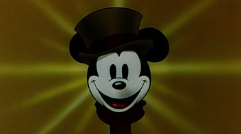Movie still from “Mickey's Christmas Carol” (1983), directed by Burny Mattinson – A cartoon of mickey mouse wearing a top hat; Close Up shot, Low angle