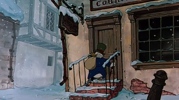 Movie still from “Mickey's Christmas Carol” (1983), directed by Burny Mattinson – An animated scene of a man in a blue suit and a green hat; Wide shot, Low angle