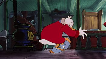 Movie still from “Mickey's Christmas Carol” (1983), directed by Burny Mattinson – A cartoon of scrooge mcduck in a red jacket; Wide shot, High angle