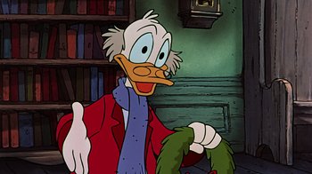 Movie still from “Mickey's Christmas Carol” (1983), directed by Burny Mattinson – A cartoon duck wearing a red jacket; Close Up shot, Over the shoulder angle