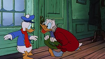 Movie still from “Mickey's Christmas Carol” (1983), directed by Burny Mattinson – Two cartoon characters one of which is holding a gun; Medium shot, Over the shoulder angle