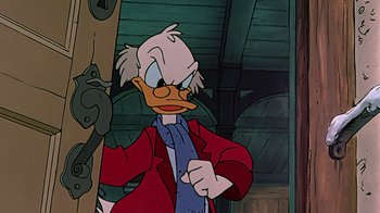Movie still from “Mickey's Christmas Carol” (1983), directed by Burny Mattinson – A cartoon character with a tie; Close Up shot, Over the shoulder angle