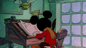 Movie still from “Mickey's Christmas Carol” (1983), directed by Burny Mattinson – A cartoon of mickey mouse sitting at a desk; Medium shot, Over the shoulder angle