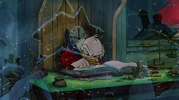 Movie still from “Mickey's Christmas Carol” (1983), directed by Burny Mattinson – An animation of scrooge mcduck sitting at a table reading a book; Medium shot, High angle
