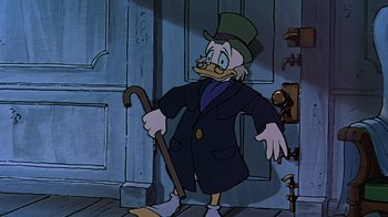 Movie still from “Mickey's Christmas Carol” (1983), directed by Burny Mattinson – A drawing of scrooge mcduck holding a walking stick; Medium shot, High angle