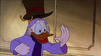 Movie still from “Mickey's Christmas Carol” (1983), directed by Burny Mattinson – A cartoon of scrooge mcduck wearing a top hat; Close Up shot, Over the shoulder angle
