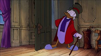 Movie still from “Mickey's Christmas Carol” (1983), directed by Burny Mattinson – A cartoon of scrooge mcduck standing in front of an open door; Medium shot, Low angle