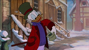 Movie still from “Mickey's Christmas Carol” (1983), directed by Burny Mattinson – Scrooge mcduck in a red coat and a green hat; Medium shot, Low angle