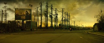 Movie still from “Micmacs” (2009), directed by Jean-Pierre Jeunet – An image of an electric power line in the middle of the day; Extreme Wide shot, Low angle