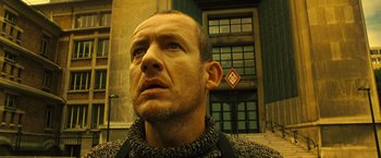 Movie still from “Micmacs” (2009), directed by Jean-Pierre Jeunet – A person looking up at the sky; Close Up shot, Low angle