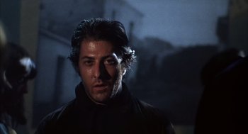 Movie still from “Midnight Cowboy” (1969), directed by John Schlesinger – A person wearing a black jacket; Close Up shot, Low angle