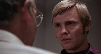 Movie still from “Midnight Cowboy” (1969), directed by John Schlesinger – A person talking to another person; Close Up shot, Over the shoulder angle