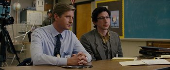 Movie still from “Midnight Special” (2016), directed by Jeff Nichols – Two men sitting at a table in front of each other; Medium shot, Over the shoulder angle