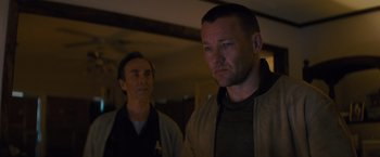 Movie still from “Midnight Special” (2016), directed by Jeff Nichols – Two men standing next to each other in a room; Close Up shot, Over the shoulder angle