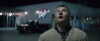 Movie still from “Midnight Special” (2016), directed by Jeff Nichols – A person looking up at the sky; Close Up shot, Low angle