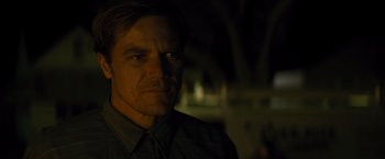 Movie still from “Midnight Special” (2016), directed by Jeff Nichols – A person wearing a shirt and tie; Close Up shot, Over the shoulder angle