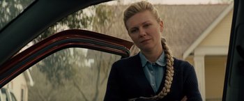 Movie still from “Midnight Special” (2016), directed by Jeff Nichols – A woman in a blue jacket with a braid in her hair; Close Up shot, Over the shoulder angle