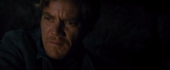 Movie still from “Midnight Special” (2016), directed by Jeff Nichols – A man's face in the dark; Close Up shot, Over the shoulder angle