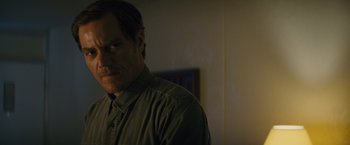 Movie still from “Midnight Special” (2016), directed by Jeff Nichols – A person wearing a green shirt; Close Up shot, Low angle