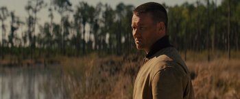 Movie still from “Midnight Special” (2016), directed by Jeff Nichols – A person standing in a field; Close Up shot, Over the shoulder angle