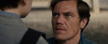 Movie still from “Midnight Special” (2016), directed by Jeff Nichols – A person with blue eyes; Close Up shot, Over the shoulder angle