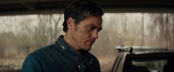 Movie still from “Midnight Special” (2016), directed by Jeff Nichols – A person wearing a jean jacket; Close Up shot, Over the shoulder angle