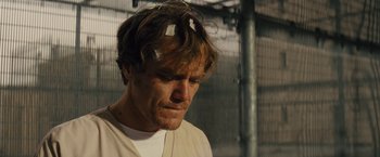 Movie still from “Midnight Special” (2016), directed by Jeff Nichols – A person with wires in their hair; Close Up shot, High angle