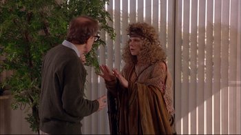 Movie still from “Mighty Aphrodite” (1995), directed by Woody Allen – A man and a woman talking to each other; Medium shot, Over the shoulder angle