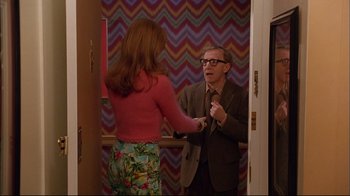 Movie still from “Mighty Aphrodite” (1995), directed by Woody Allen – A man and a woman standing in front of each other; Medium shot, Over the shoulder angle