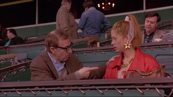 Movie still from “Mighty Aphrodite” (1995), directed by Woody Allen – A man and a woman talking to each other; Medium shot, Over the shoulder angle