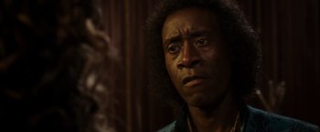 Movie still from “Miles Ahead” (2015), directed by Don Cheadle – A person looking at the camera; Close Up shot, Over the shoulder angle