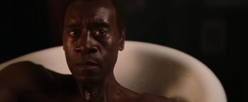 Movie still from “Miles Ahead” (2015), directed by Don Cheadle – A man's face in a bathtub; Close Up shot, High angle