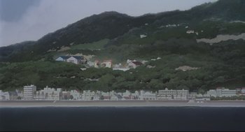 Movie still from “Millennium Actress” (2001), directed by Kô Matsuo – A view of a city from the water; Extreme Wide shot, High angle