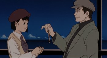 Movie still from “Millennium Actress” (2001), directed by Kô Matsuo – An animated scene of a man and a woman holding keys; Close Up shot, High angle