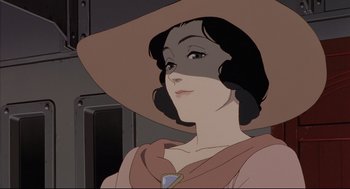 Movie still from “Millennium Actress” (2001), directed by Kô Matsuo – An animated picture of a woman wearing a hat; Close Up shot, Low angle