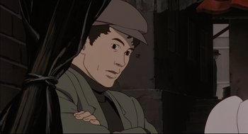 Movie still from “Millennium Actress” (2001), directed by Kô Matsuo – An animated picture of a man with a hat on; Close Up shot, Low angle